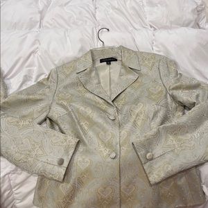 Women a pant suit by Adrianna